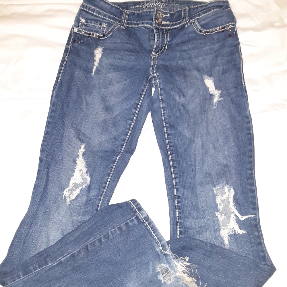 Distressed vanity jeans